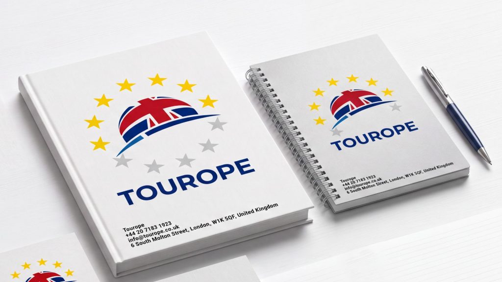 Tourope branded notepads and books in A4, A5 and A6 sizes with spiral‑bound, glued‑top and hardback options, featuring sharp readable covers with Tourope’s UK contact details and crisp bright‑white pages.